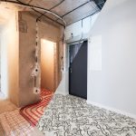 Old apartment with brick walls and new renovated flat with doors and stylish design in white tones. Inferior of apartment before and after renovation.
